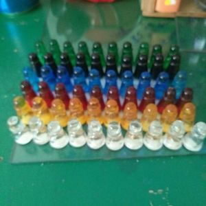 Chinese checker pieces.